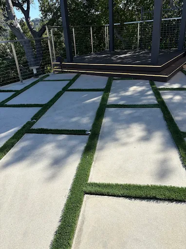 Concrete pavers with turf joints